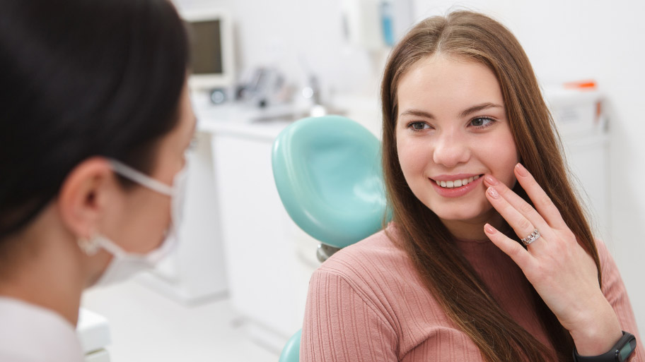 Adult having a dental exam with a Dentist in Urbandale
