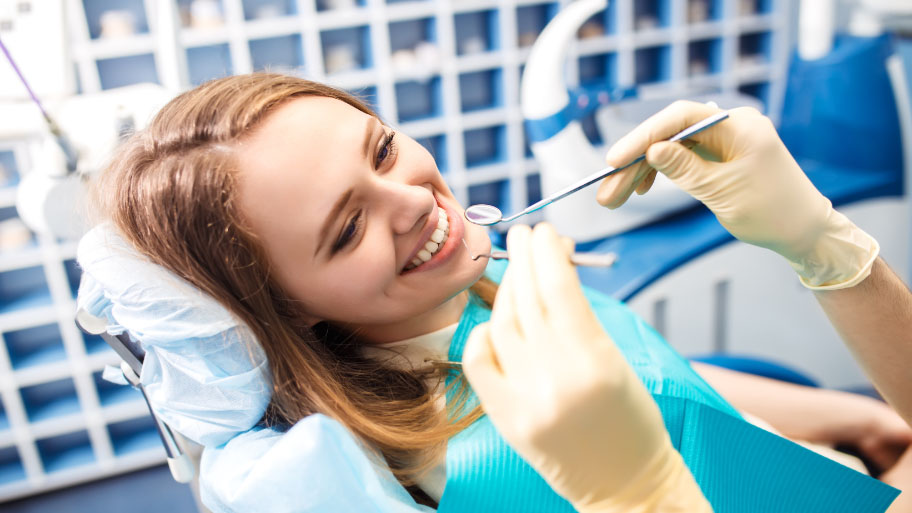 Woman Having Dental Cleaning in Des Moines