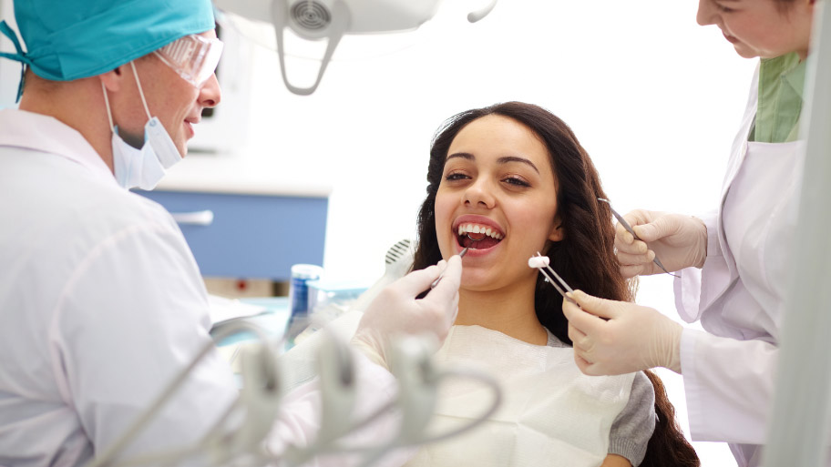 Adult Woman having a dental exam with a Dentist in Des Moines