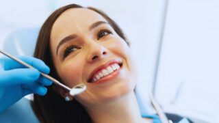 Woman confident after learning the facts about Common Dental Procedures