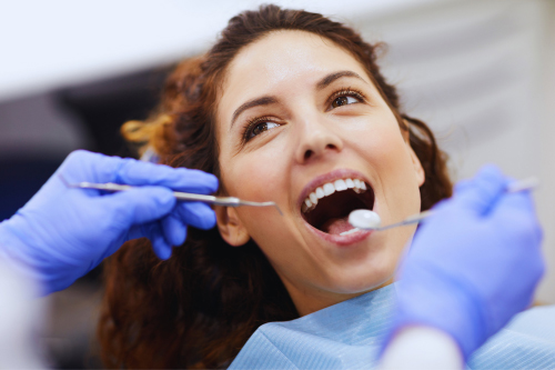 Patient having a dental exam in West Des Moines